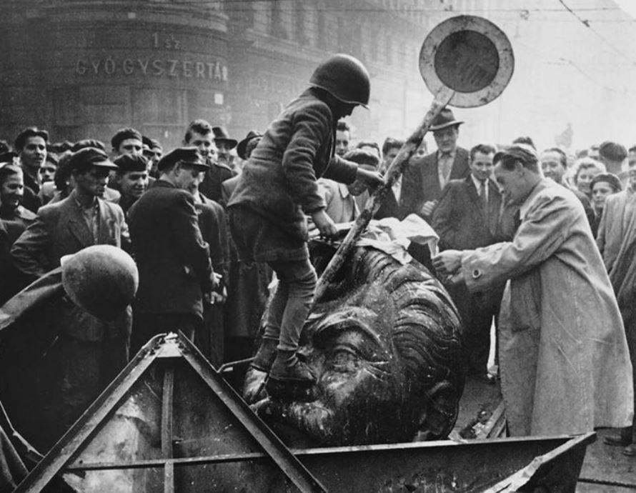 The destruction of a statue of Stalin